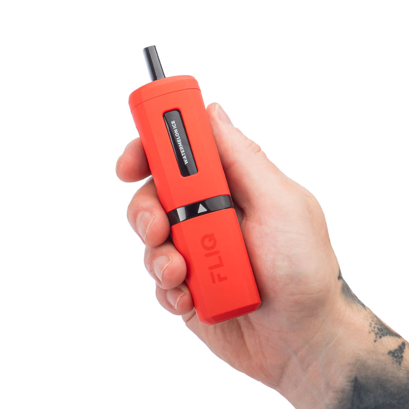 Red Edition Avomi Fliq vape kit in hand.