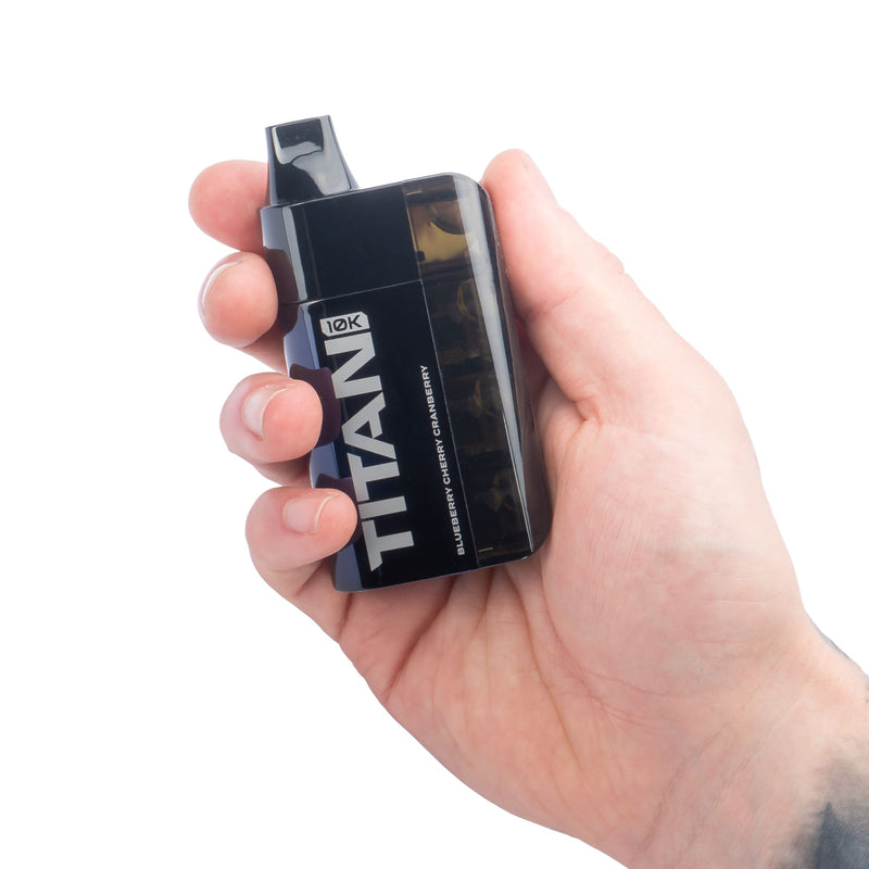 Bluberry Cherry Cranberry Titan 10K disposable vape kit in hand.